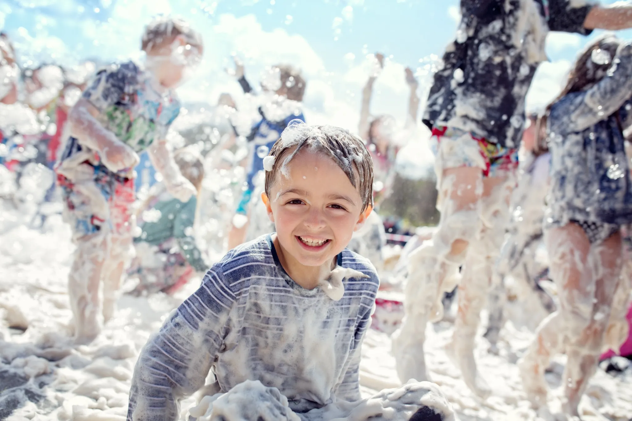 Kids enjoying foam party